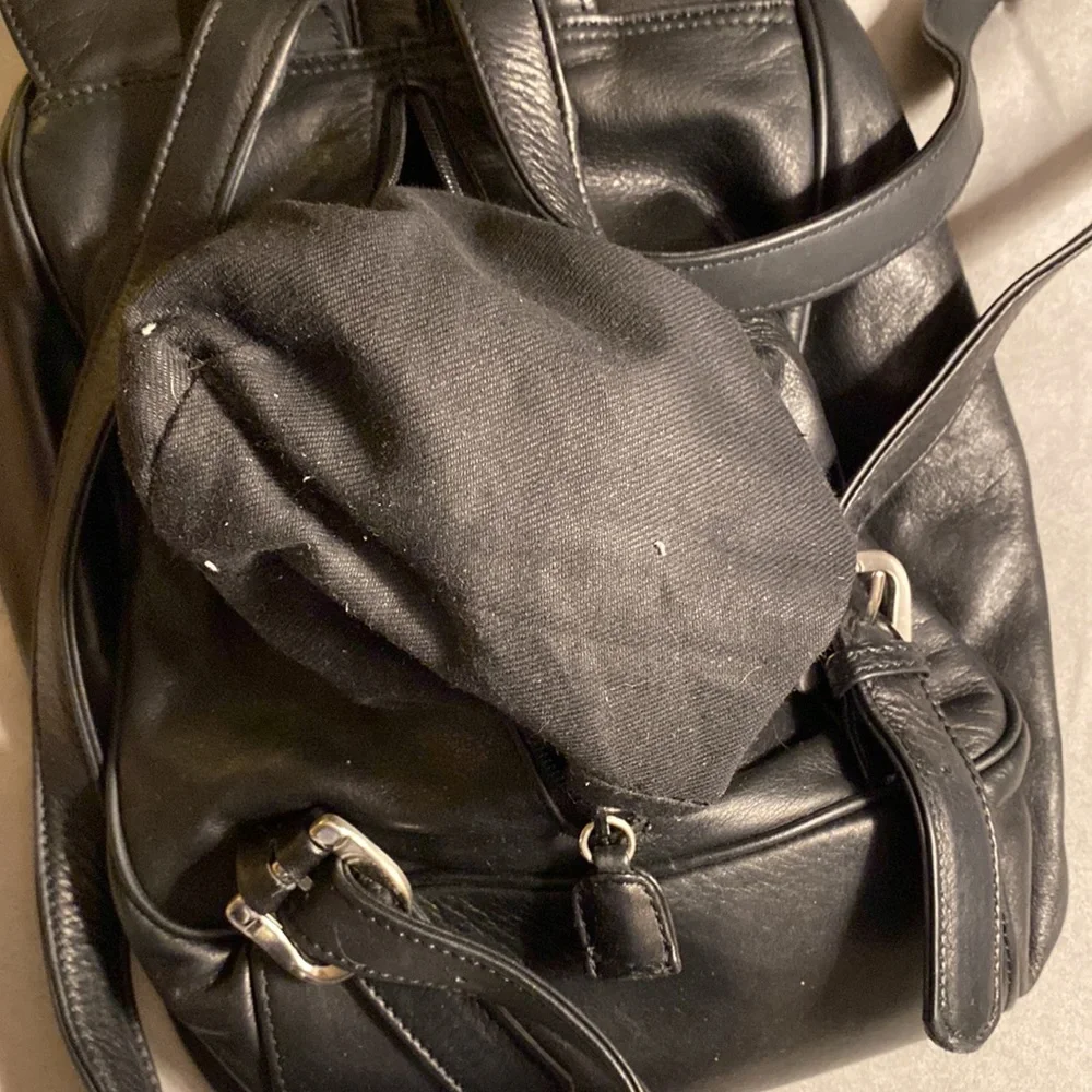 Nine West small genuine leather small backpack.